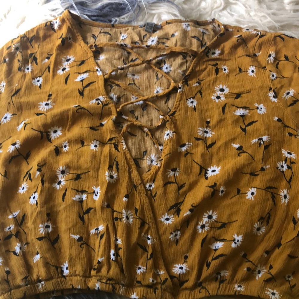 Mustard top with white flower designs